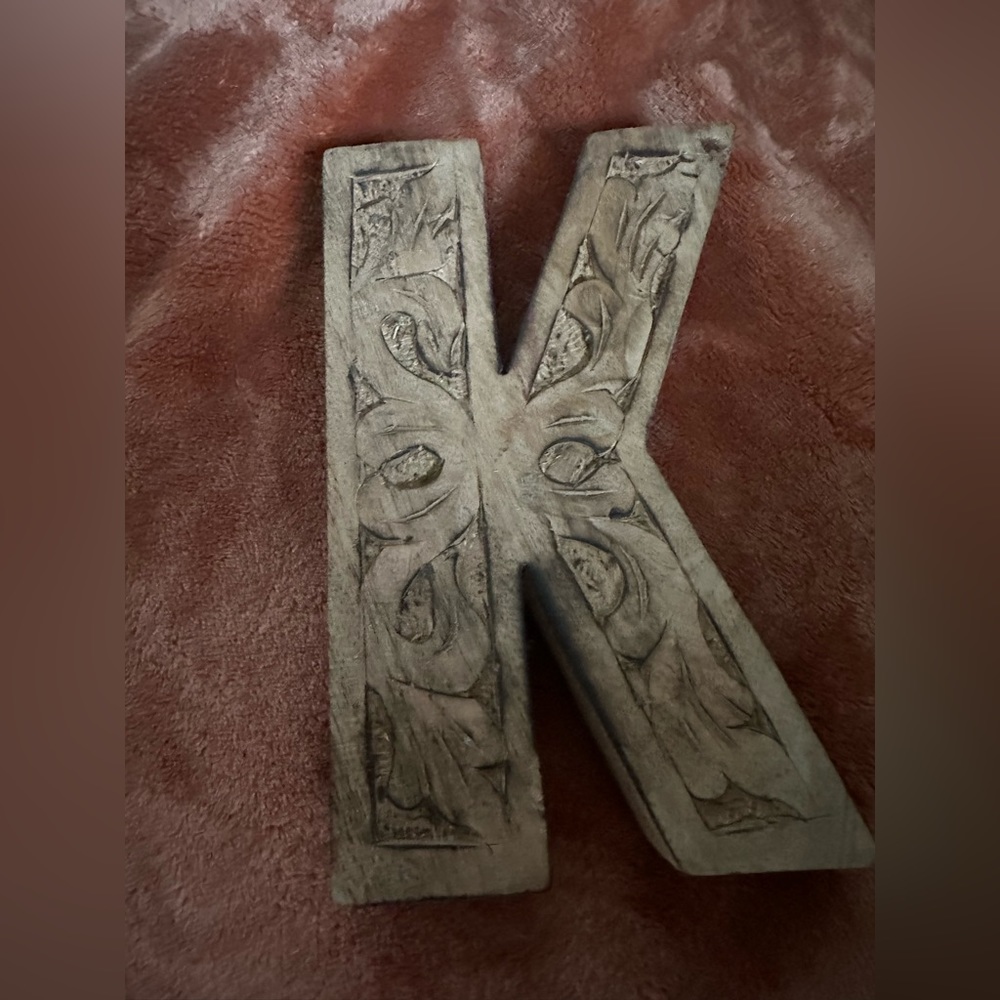 Wood initial “ K”